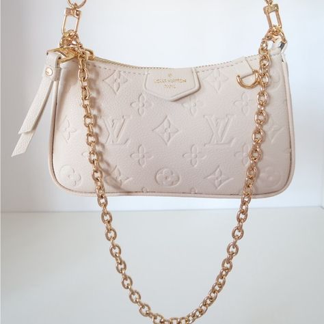 LV Empreinte Easy Pouch On Strap Cream Lv Empreinte, Vuitton Handbags, Louis Vuitton Handbags, Dust Bag, Louis Vuitton, Pouch, Handbags, Cream, Plus Fashion