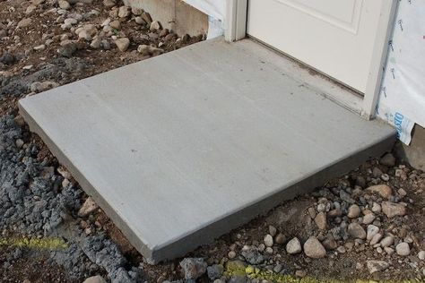 Whether it’s for a shed, stair landing, dog kennel or hot tub, a small concrete pad is an easy and inexpensive home improvement project. Turn that section of matted grass into a functional and practical surface with a little elbow grease and this know-how. ^ #Concrete #ConcreteProject #ConcreteProjects #Patio #ConcretePatio #DIY #DIYProject #DIYProjects #Cement #CementProjects #CementPatio #CementSidewalk #CementDIY Pouring Concrete Slab, Diy Concrete Patio, Cement Patio, Concrete Pad, Cement Diy, Stair Landing, Deck Stairs, Dog Kennel Outdoor, Concrete Steps