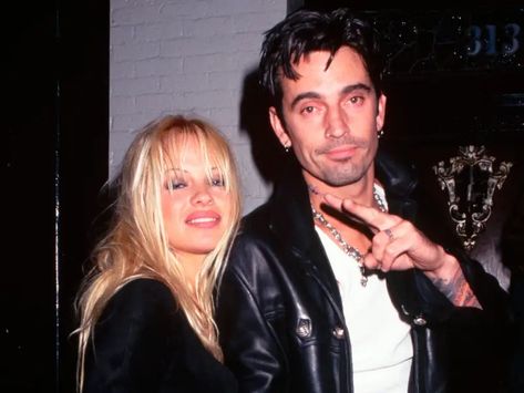 Inside Pamela Anderson and Tommy Lee's Tumultuous Relationship - Business Insider Tommy Lee Pamela Anderson, Tommy Lee And Pam Anderson, Pamela Anderson And Tommy Lee, Relationship Timeline, 90s Shorts, Melrose Place, Tommy Lee, Head & Shoulders, Motley Crue