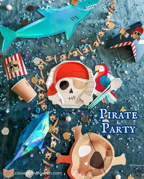 When your kid asks for a half pirate 🏴‍☠️ half shark 🦈 birthday. Not a 🏴‍☠️ 🦈 (that is a theme I found), it has to be half and half! So, how did I do? Comment SHOP below to receive a DM with the link to shop this post on my LTK ⬇ https://liketk.it/4JEth Everything pirates for the most swashbuckling party! Do you have a pirate or shark lover? Best summer palette for your little matey! #ltkparties #ltkseasonal #ltkkids This was a while back but half of the decorations are still up and we’re... Pirate Party Decorations, Summer Palette, Pirate Cake, Shark Lover, Party Garland, Shark Party, Shark Birthday, Kids Party Supplies, Half And Half