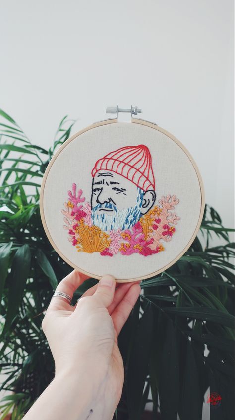 Handmade embroidery hoop of the legend Bill Murray as Steve Zissou in one of my fave Wes Anderson movies. I really love the colour palette of this one☺️ Wes Anderson Cross Stitch, Wes Anderson Embroidery, Pop Culture Embroidery, The Life Aquatic, Steve Zissou, Wes Anderson Movies, Life Aquatic, Bill Murray, Hoop Embroidery