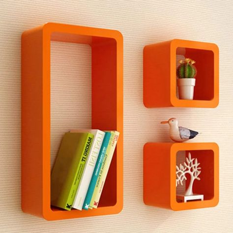 Retro 70s Bedroom Ideas: A Timeless Style for Your Home Floating Wall Storage, Colorful Wall Shelf, Funky Floating Shelves, Colorful Wall Shelves, Funky Wall Shelves, Cool Wall Shelves, Colorful Floating Shelves, 70s Shelves, 70s Room Ideas