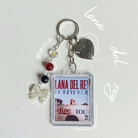 LDR photocard keychain 🎀 price range: ₹320- 310 we're open for customs!! dm to purchase or shop via website 🎀 . #viral #trending #jewelleryindia #jewellery #handmadejewellery #hellokitty #sanrio #jewellerydesigner #jewellerymaker #jewellerylover #explore Photocard Keychain, Lana Del Re, We're Open, Crochet Clothing And Accessories, Price Range, Custom Keychain, Dream Jewelry, Jewelry Maker, Phone Charm