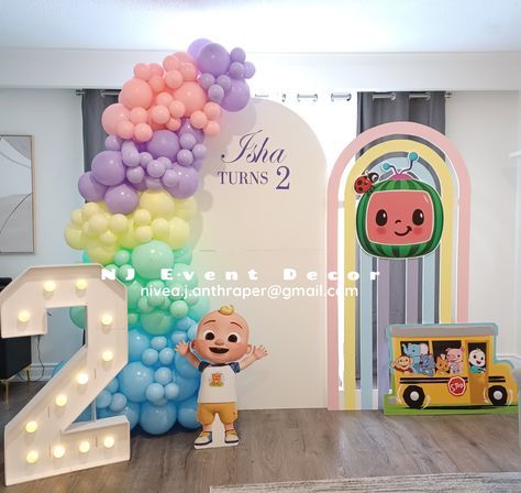 Pastel balloon garland with chiara and rainbow arch backdrop for cocomelon theme birthday #cocomelon #rainbowparty  #pastelballoons #kidsbirthday #partydecorations #rainbowarch Rainbow Arch Backdrop, Pastel Balloon Garland, Birthday Cocomelon, Cocomelon Theme, Rainbow Arch, Pastel Balloons, Arch Backdrop, Rainbow Party, Theme Birthday