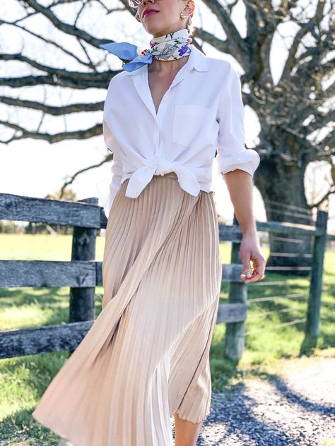 Romantic Shirt Outfit, Button Down Shirt With Pleated Skirt, Scarf Spring Outfit, White Silk Scarf Outfit, Pleated Silk Skirt Outfit, Spring Skirts 2023, Beige Pleated Skirt Outfit Summer, Silk Scarves Outfits, Silk Pleated Skirt Outfit