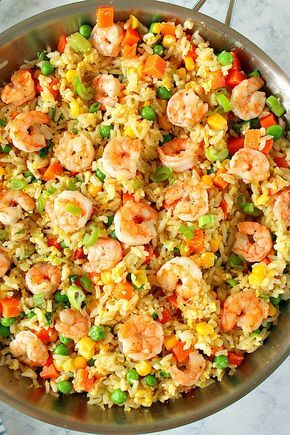 This Shrimp Fried Rice Recipe is the fastest and easiest takeout dinner you can make at home! You only need shrimp, leftover rice, frozen veggies, soy sauce and 15 minutes to turn it into delicious dinner. Shrimp Rice And Veggies, Leftover Shrimp Recipes, Thai Shrimp Fried Rice, Amazing Food Recipes, Easy Shrimp Fried Rice Recipe, Starch Recipes, Rice With Shrimp, Shrimp Fried Rice Recipe, Shrimp And Rice Recipes