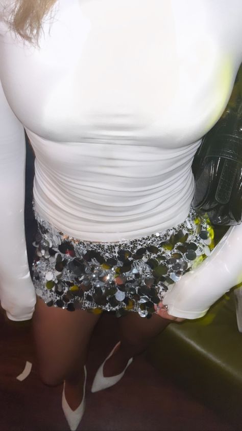 Bd Party Outfit, Silver And White Outfits Party, White Party Aesthetic Outfit, Sequin Silver Skirt, Silver And Black Outfit Parties, Silver Sequin Mini Skirt, Going Out White Outfit, Silver Skirt Halloween Costume, Black White And Silver Outfits