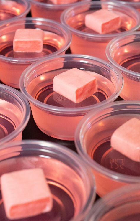 These fun and fruity pink Starburst jello shots are perfect for girl's night, bachelorette weekends, gender reveal parties and more! Pink Whitney Jello Shots, Pink Starburst Jello Shots, Pink Lemonade Jello Shots, Starburst Jello Shots, Lemonade Jello Shots, Iced Caramel Macchiato Recipe, Pink Whitney, Caramel Macchiato Recipe, Girls Night Drinks