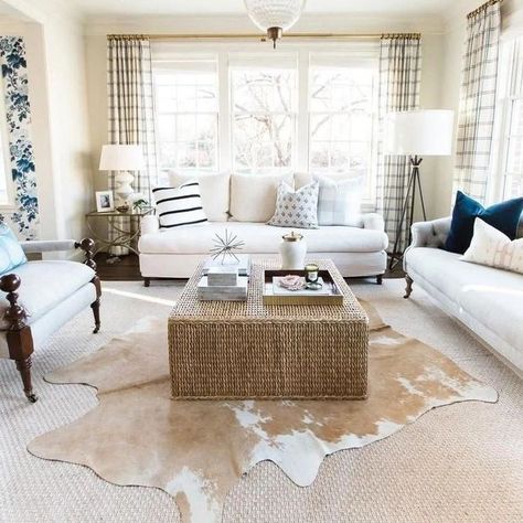 A rug above the rest where a layered cowhide takes center stage, adding depth and dimension to the living room's rustic-chic vibe, and tying together the entire space with its earthy tones and organic texture Explore variety of natural cowhides at our store🛍 Ebay: www.ebay.com/str/storeera 🛒 Etsy: www.etsy.com/shop/storeera 🛒 🔗Link in bio #cowhiderug #cowprint #arearug #interiordesign #diyrug #cowhide #cow #braziliancowhide #genuinerug #interiordesign #interiordesignideas #floorrug #inter... Hide Rug Living Room, Layered Cowhide Rug, Cowhide Rug Living Room, Living Room Classic, Interior Simple, Coastal Living Rooms, Cowhide Rug, Décor Diy, Cow Hide