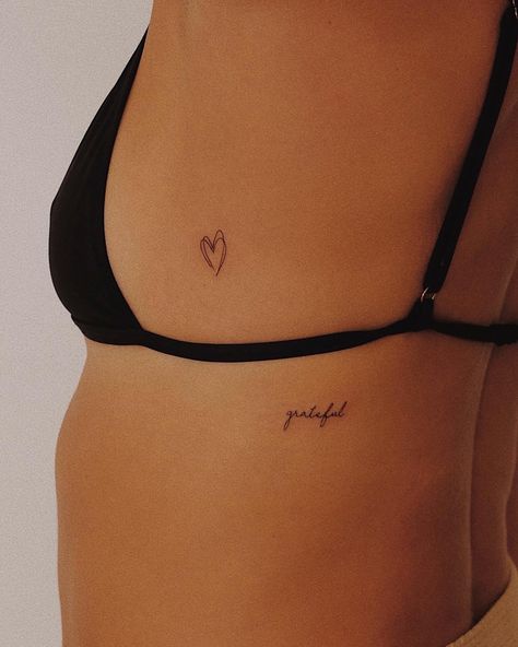 Tiny tattoos with big meaning 🫶🏼 Tattoo Under Chest, Tattoo Ribs, Small Rib Tattoos, Tiny Heart Tattoos, Small Quote Tattoos, Quote Tattoo, Tattoo Script, Stick And Poke, Lettering Styles