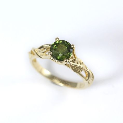 Exclusive to Benati. This ring features a botanical inspired design and a beutiful natural green sapphire. Lovely detailed leaves and romantic mood with a touch of vintage style. Main stone: 1ct round cut green sapphire Metal type: 14k/18k gold (white, yellow, rose) or Platinum Band width tapered:  2.2mm - 4mm  Customization is available. * Sent with express shipping (approx. 2-4 business days) with tracking number and signature confirmation to your door. * Important: please include a phone number you can be reached at, for the shipping courier. * Sent with elegant engagement ring box. * Brand new - Made to order - Please allow approx. 14 business days to craft. * If you need the ring by a specific date - please let us know. * Buy with confidence; have a look at our review page: https://ww Emerald And Gold Ring Vintage, Unique Engagement Rings Green, Green Rings Engagement, 1 Karat Ring, Green Stone Engagement Ring, Green Ring Gold, Colorful Engagement Rings, Green Engagement Ring, 1 Carat Ring