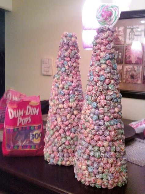 Made these Dum-Dum candy trees for our Re-Grand Opening part at Old Navy. 600 Dum-Dums on each styrofoam cone. Sucker Tree, Lollipop Centerpiece, Queen Sugar, Lollipop Bouquet, Decoration Business, Candy Trees, Lollipop Tree, Candy Decor, Candy Arrangements