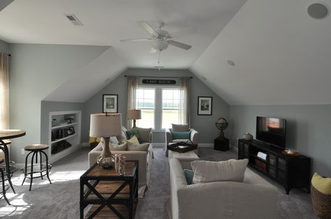 I like the shelves built into the knee wall. Room With Slanted Ceiling, Attic Bonus Room, Bonus Room Decorating, Garage Bonus Room, Bonus Room Above Garage, Room Over Garage, Bonus Room Design, Room Above Garage, Bonus Room Ideas