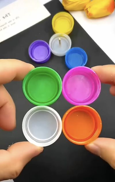 70 Creative Bottle Cap Ideas and Crafts - Craftionary Plastic Caps Projects, Medicine Bottle Cap Crafts, Crafts With Plastic Bottle Caps, Pop Cap Crafts, Milk Cap Crafts, Crafts With Bottle Caps, Bottle Cap Crafts For Kids, Bottle Cap Ideas, Bottle Caps Diy