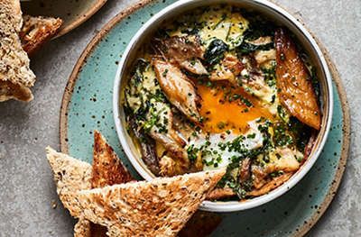 Smoked Mackerel & Spinach Baked Eggs Recipe | Waitrose & Partners Mackerel Fish Recipes, Mackerel Recipe, Pastry Case, Delicious Quiche, Spinach Bake, Mackerel Recipes, Baked Eggs Recipe, Mackerel Fish, Smoked Mackerel