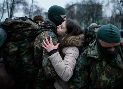 TIME's Best Pictures of the Week: Jan. 16 – Jan. 23 | Time Soldier Love, Photo Journalism, Military Couples, Army Couple, Hot Army Men, Masked Men, Military Love, Army Love, Pictures Of The Week