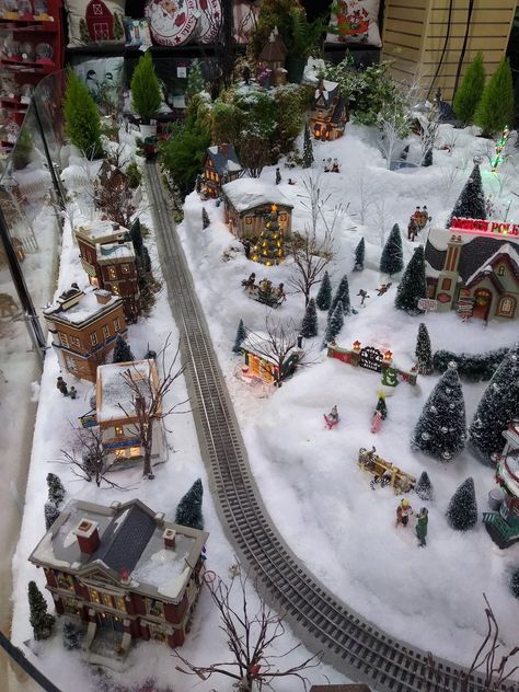 This area offers plenty of options for those looking to marvel at model trains traveling through realistic villages of holiday cheer. Christmas Village Train, Train Village, Christmas Tree Village Display, Train Tunnel, Christmas Tree Village, Train Platform, Holiday Train, Homestead Gardens, Live Tree