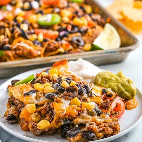 Oven Nachos, Leftover Chili Recipes, Ground Beef Nachos, White Cheese Dip Recipe, Eating On A Dime Recipes, Sheet Pan Nachos, Nacho Recipes, Pan Nachos, Baked Nachos