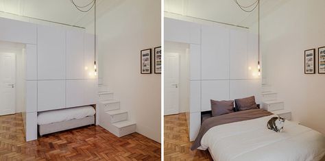 This small modern apartment has a wall of white storage cabinets that allows a pull-out bed to be hidden within it. Depending on how much you pull the bed out, it can also double as a couch or day bed. Bed In Floor, Pull Down Wall Bed, Folding Double Bed, Sofa Photography, Apartment Bed, Pullout Bed, Beds For Small Spaces, Atelier Studio, White Storage Cabinets