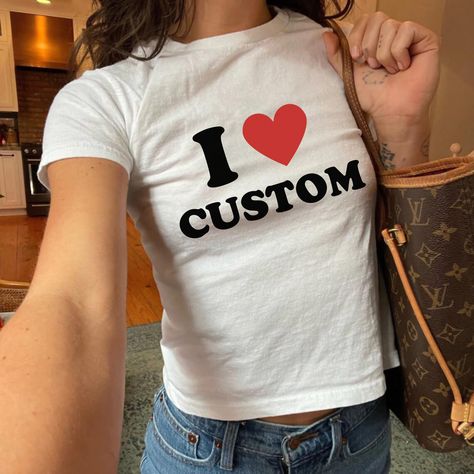 Make a statement with our custom "I Love" shirts! Perfect for those who appreciate personalized fashion, these tees combine comfort and style, reminiscent of the iconic 90s era. Get yours today and wear your heart on your sleeve! 💕👚
#PersonalizedCropTop #IHeartCropTop #Y2KBabyTee #CustomCropTop #PersonalizedFashion #TrendyCropTop #UniqueStyle #FashionForward #CustomizedClothing #StatementPiece #ChicCropTop #PersonalizedApparel #Fashionista #StylishLook #ProfessionalStyle I Heart Shirt, Custom Crop Top, Baby Tee Shirts, Text Shirt, Streetwear Mode, Baby Tees Y2k, Y2k Baby Tee, Love Baby, Baby T Shirts