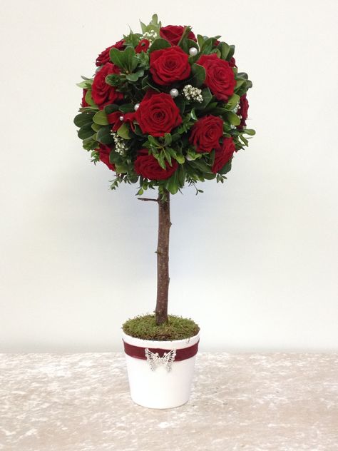 Red rose topiary design - romance valentines Christmas wedding - created by Artistic Floral Services Topiary Wedding, Indoor Topiary, Rose Topiary, Sympathy Bouquets, Everyday Bouquet, Floral Topiaries, Christmas Floral Designs, Topiary Centerpieces, Wood Box Centerpiece