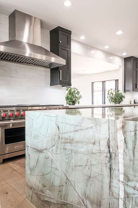 Waterfall Island with a Granite material Granite Waterfall, Waterfall Kitchen, Waterfall Island, Modern Kitchen Remodel, Modern Kitchen, Kitchen Remodel, Marble