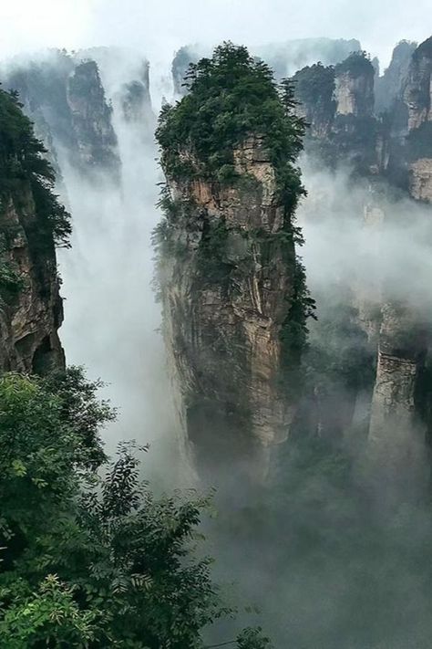 Here is the Mount Hallelujah in the ‘Floating Planet’ of the movie Avatar. Go to www.chinatraveldestination.com to know more about Zhiangjiajie, China. China Floating Mountains, Floating Mountains China, Avatar Mountains, China Mountains, China Scenery, Cliff Landscape, Floating Mountains, Zhangjiajie China, Zhangjiajie National Forest Park