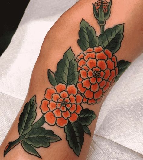 Marigold Neotraditional, Marigold Elbow Tattoo, Marigold Flower Tattoo Traditional, Neo Traditional Marigold Tattoo, Marigold Flower Tattoo Color, American Traditional Marigold Tattoo, Marigold Tattoo Traditional, Marigold Traditional Tattoo, Traditional Marigold Tattoo