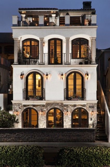 Love the abundance of arched windows on this Mediterranean-style villa  (via David Watson, Architect) Mediterranean Exterior, Casas Coloniales, Mediterranean Decor, Pool Design, Arched Windows, Mediterranean Style, Home Fashion, 인테리어 디자인, My Dream Home