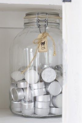 diy idea:  clear container for tealights what a cute way to store your tealights...imagine how pretty it would be with several different colors in a mason jar! Diy Change Jar, Mini Glass Container Craft Ideas, Tea Bag Storage Ideas Mason Jars, Diy Storage Jars, Diy Mini Terrarium Glass Jars, Jar Storage, Clear Container, Tea Light Candles, Cleaning Organizing