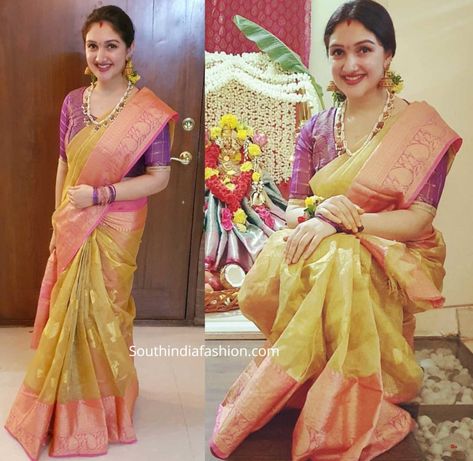 Sridevi Vijaykumar celebrated Varalakshmi Vratam wearing a gold and pink combination kanjeevaram saree paired with a purple blouse. She styled her look with matching bangles, pearl necklace, and a pair of gold jhumkas! Sridevi Old Pictures, Sridevi Vijaykumar, Gold Jhumkas, Pink Combination, Kuchu Designs, Saree Kuchu Designs, Traditional Blouse Designs, Beautiful Sarees, Traditional Look