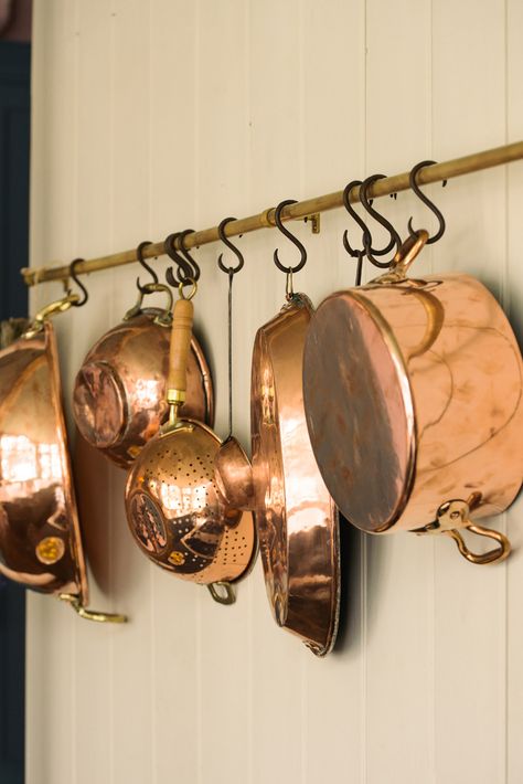 deVOL directory: The St. John’s Square showroom kitchen -PART 1 - The deVOL Journal - deVOL Kitchens 1700s Cottage, Pink Green Kitchen, Copper Pans Hanging, Copper Pots Display, Copper Pots And Pans, Devol Kitchens, Copper Decor, Copper Pans, Copper Cookware