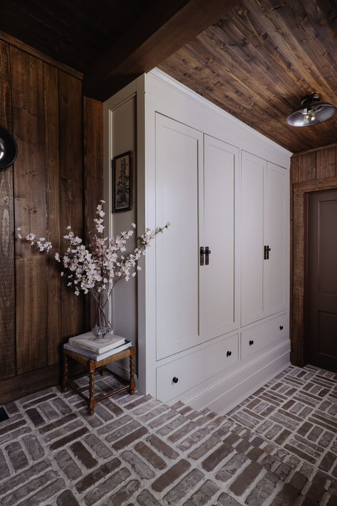 Dark Wood Walls, Laundry Room And Mudroom, Rustic Laundry Room, Hutton House, Nadine Stay, Moody Rustic, Rustic Laundry, Brick Floors, Built In Closet