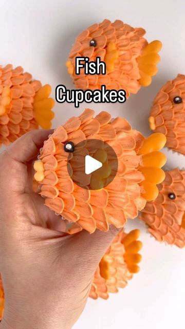 Alex LaRosa on Instagram: "Fish cupcakes 🐟

✨ no fish were harmed in the making of this video

✨ a couple days before you want to make your fish cupcakes make your royal icing transfers for the fins and the mouth

✨ using piping tip 103 pipe petals on your cupcake

✨ placed on your fins and mouth

✨ add your eyeball

Supplies @nycake
Piping tips @wiltoncakes 
Colors @colour.mill 
.
.
.
.
.
#alexlarosabakery #fishcupcakes #orangecupcakes #colourmillmade #summercupcakes #beachcupcakes #lakecupcakes" Fish Cupcakes, Beach Cupcakes, Fishing Cupcakes, Summer Cupcakes, Piping Tip, Icing Transfers, Orange Cupcakes, Fish Theme, Royal Icing Transfers