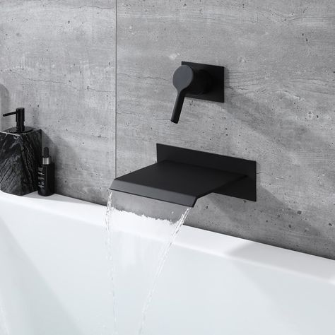 This elegant modern wall mount tub faucet with waterfall spout is just what you need to fill up your tub with water and let yourself indulge in a relaxing and rejuvenating soak. SUMERAIN's simple design makes this tub filler a perfect match to any bathroom decor. High flow rate of 7.31GPM@60PSI can fill up your tub in minutes! Solid brass rough-in valve included, you don't need to pay extra. Classic single lever handle easy control water flow and temperature. Spout and handle have cover plates w Black Shower Faucet, Bathtub Spout, Modern Tub, Wall Mount Tub Faucet, Wall Faucet, Bathroom Shower Faucets, Roman Tub Faucets, Waterfall Wall, Waterfall Faucet