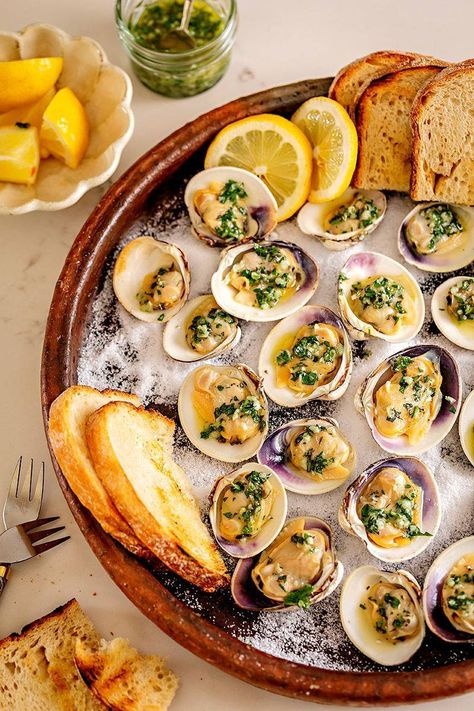 Vanessa Seder shares her recipe for Grilled Local Littleneck Clams in an Herb, Caper, and Butter Sauce, a perfect summer meal. Seafood Camping Meals, Maine Seafood, Food Advice, Grilled Bread, Raw Bars, Fresh Oregano, Butter Sauce, Camping Food, Easy Dinner