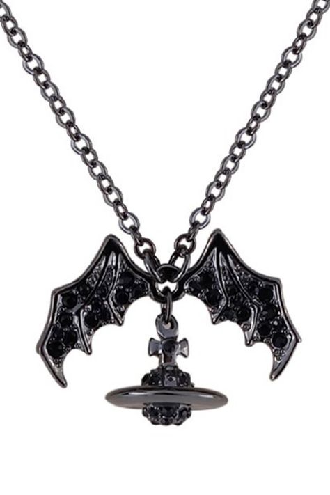 Elevate your dark fashion game with the Vivienne Westwood Bat Wing Orb Necklace. Crafted from high-quality metal alloy material, this necklace exudes an aura of mystique and elegance, perfect for those embracing alternative styles. The iconic bat wing design adds a touch of gothic allure, making it a must-have accessory for enthusiasts of gothcore and opiumcore aesthetics. Free shipping in the US and worldwide. Chain size - 48 cm / 18.897 inches. Exudes an aura of mystique and elegance, perfect for dark fashion aficionados. Iconic bat wing design adds a touch of gothic allure. Crafted from high-quality metal alloy material for durability and longevity. Suitable for those embracing alternative styles such as gothcore and opiumcore aesthetics. Featured as a statement piece in Dark Fashion Ti Vivienne Westwood Orb Necklace, Vivienne Westwood Necklace, Vivienne Westwood Fashion, Orb Necklace, Y2k Inspo, Bat Necklace, Alt Clothes, Dark Jewelry, White Sneakers Men