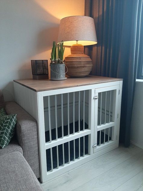 Cozy Den: A charming hideaway for your furry friend where they can relax and unwind in comfort and style. Storage On Top Of Dog Crate, Indoor Dog Crate Furniture, Hide Dog Kennel, Diy Dog Crate Desk, Dog Area In Living Room, Homemade Dog Crate, Indoor Dog Area Ideas, Pet Room Ideas Cats, Dog Crate Aesthetic