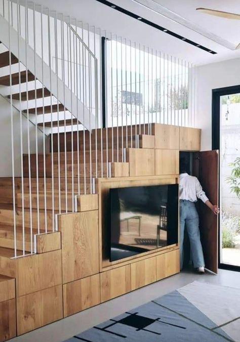 Staircase And Tv Unit Design, Tv Under Staircase, Two Way Staircase, Tv Under Stairs Living Room, Tv Under Stairs, Living Room Under Stairs, Interior Design Under Stairs, Staircase In Living Room, Room Under Stairs