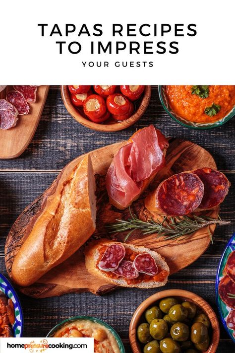 a wide spread of Tapas Recipes authentic Spanish Tapas Restaurant, Tapas Dinner Party Ideas, Tapas At Home, Spanish Tapas Charcuterie Board, Tapas Style Food, Spanish Tapas Ideas, Spain Tapas, Authentic Spanish Tapas Recipes, Tapas Board