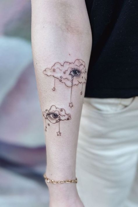 "These tattoo ideas offer a touch of fantasy and fun! Explore 12 whimsical tattoos that are sure to inspire your next ink." Imagination Tattoo Ideas, Humpty Dumpty Tattoo, Cute Small Tattoos Unique, Opposite Friend Tattoo, Retro Futurism Tattoo, Tooth Fairy Tattoo, Artsy Tattoo Ideas, Whimsical Tattoos For Women, Magic Tattoo Ideas