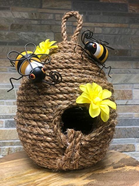 I’ve had this Beehive project on my to-do list for quite some time and I finally got around to doing it! It is really easy and fun to do! Here's the finished project, check out the steps below to make one for yourself!! Manila rope was what I used for the hive. I also used a mixing bowl as the mold to get the right shape. Start by wrapping the rope around the mixing bowl. Using hot glue, glue periodically as you go to secure the shape in place. Keep wrapping your way up and one you hit… Beehive Tutorial, Diy Bee Hive, Bee Hive Decor, Hive Decor, Bee Hives Diy, Bee Hive Craft, Bee Skeps, Diy Bee, Homemade Fabric Softener