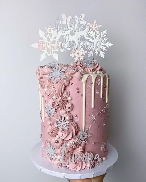 January 1st Birthday Girl, Winter Onederland Cake Smash, Pink Winter Cake, One Year Old Birthday Party Girl Winter, Pink Winter Onederland Cake, Winter Wonderland 1st Birthday Girl Cake, Winter Wonderland Pink Cake, Purple Snowflake Cake, Pink Winter Wonderland First Birthday