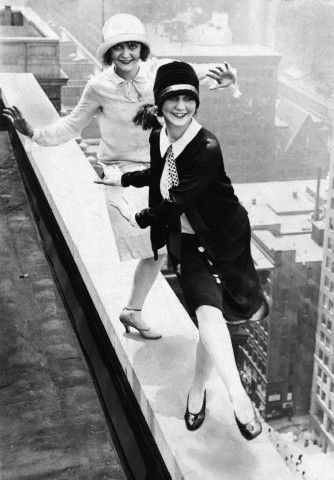 Flappers dancing on the rooftop above the city, 1920s Style Année 20, Flapper Girls, Roaring 1920s, 1920s Photos, Paul Poiret, Louise Brooks, Flapper Girl, Black And White Photograph, 20s Fashion