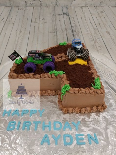 Hand carved number 4 cake with monster truck theme. Number 2 Cake Monster Truck, 4 Monster Truck Cake, Monster Truck Cake 4, Monster Truck Number Cake, Number 3 Monster Truck Cake, Number 4 Cake Boy, Monster Truck Pull Apart Cupcakes, Blaze Birthday Cake, Monster Truck Theme Birthday Party