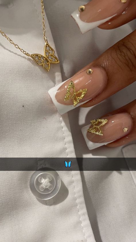 Gold Butterfly Acrylic Nails, Butterfly Nails Gold, White French Tip With Gold Charms, White And Gold Butterfly Nails, Nails With Gold Butterflies, Nails With Butterfly Charms, Nail Inspo Butterfly, Butterfly Nails White, Nail Charm Ideas