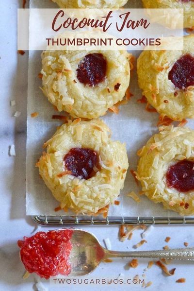 This buttery shortbread cookie recipe is coated in shredded coconut, filled with jam and baked to create an addicting thumbprint cookie. Made with only 8 ingredients ~ these cookies are always a hit with friends and family. ~ Recipe on twosugarbugs.com #cookies #jamcookies #shortbread #thumbprintcookies #coconutcookies Thumbprint Cookie, Coconut Jam, Coconut Cookies Recipes, Jam Thumbprint Cookies, Thumbprint Cookies Recipe, Buttery Shortbread, Buttery Shortbread Cookies, Jam Cookies, Shortbread Cookie Recipe