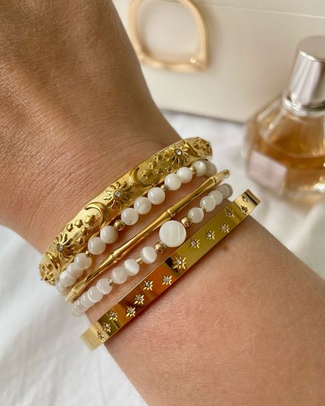 New Waterproof + Tarnish Free Bangles 😍 So excited to finally show you these New Bangles which have just landed on the website 🙌 We have:- 🌙 Moon, Stars + Sun Bangle ✨ Adjustable Steller + Serenity Star Bangle 🫶 Adjustable Grace Bangle Which ones your fav? 🤗 #waterproofjewellery #banglecollection #celestialbracelets #braceletstack Star Bangle, Gemstone Jewellery, Moon Stars, Bracelet Stack, So Excited, Gemstone Jewelry, Choker, Bangles, Moon