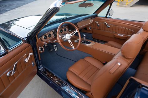 This is a 1966 Mustang GT Convertible in Nightmist Blue Metallic. It has Mercedes Saddle Brown leather interior. This car has 17x8 Styled Aluminum Charcoal wheels. It features a 460hp Ford 5.0L Ti-VCT Coyote DOHC V8 engine and a Ford 10R80 10-speed electronically controlled automatic transmission. #mustang #shelby #classicmustang #classicshelby #carinspiration #blue #bluecar #classiccar 1968 Ford Mustang Interior, Old Mustang Interior, 1966 Mustang Interior, Classic Mustang Interior, 1965 Mustang Convertible, Ford Mustang Interior, 1966 Mustang Gt, Navy Car, Ford Mustang 1969