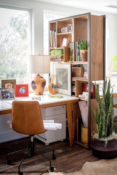 For a small home office that needs to work for two, consider creating separate spaces by utilizing two desks divided by a bookshelf turned makeshift wall. #officedecor #officeideas #officeorganization #homedecor #bhg White Wall Office Decor, His Her Home Office, Shared Office Layout, Small Office Two Desks Layout, His Her Office, Family Office Space, His And Hers Home Office, His And Hers Office, 2 Person Office